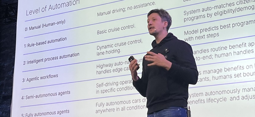 Luukas Kristjan Ilves addresses a crowd of technologists and other reporters at an event in Tallinn, Estonia, on October 8, 2025.