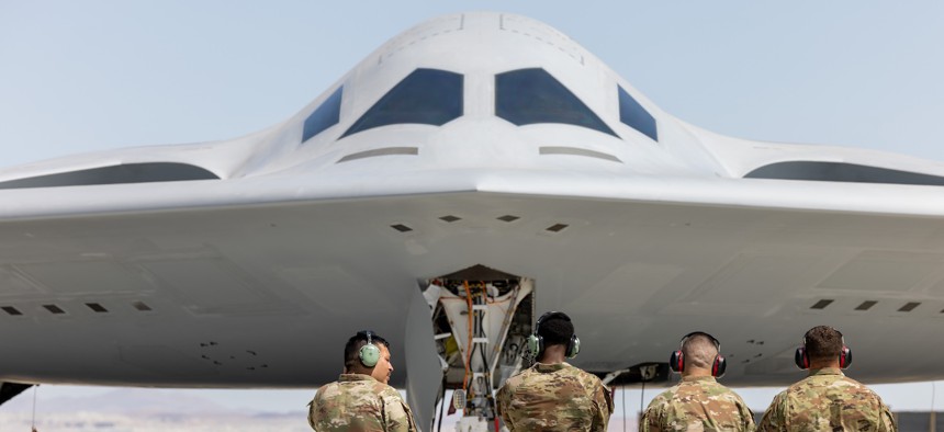 Airmen with the 912th Aircraft Maintenance Squadron prepare to recover the second B-21 Raider to arrive for test and evaluation at Edwards Air Force Base, Calif., Sept. 11, 2025.