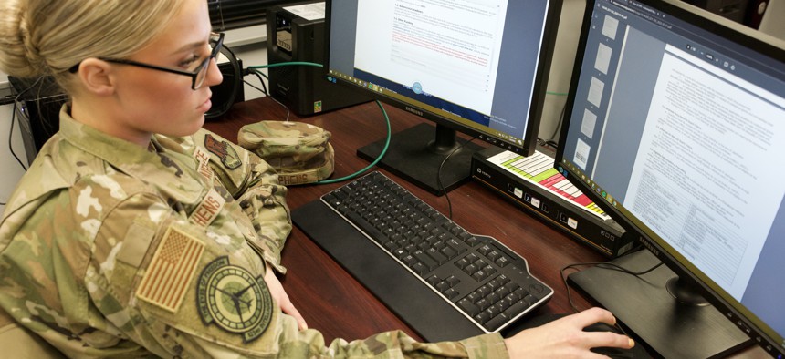 An Air Force geospatial imagery analyst with the 123rd Intelligence Squadron works in the 188th Wing Innovation Lab in Fort Smith, Arkansas, on December 21, 2022.