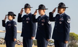 Members of the U.S. Air and Space Forces salute during their initiation ceremony as military training instructors, Oct. 17, 2024, in Texas.