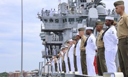 Sailors and Marines of the Iwo Jima Amphibious Ready Group – 22nd Marine Expeditionary Unit manned the rails of USS Iwo Jima (LHD 7) as they depart Naval Station Norfolk in 2018.