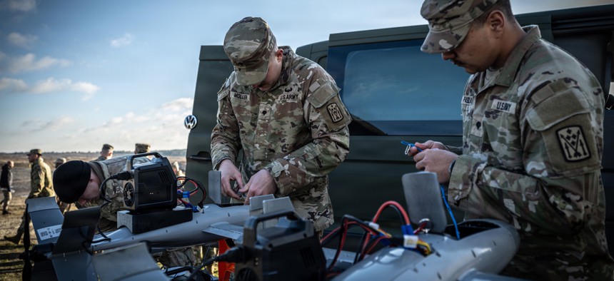 Soldiers with the U.S. Army's 10th Army Air and Missile Defense Command prepare to use the Merops c-UAS system at Nowa Deba Training Area, Poland, on Nov. 18, 2025. 