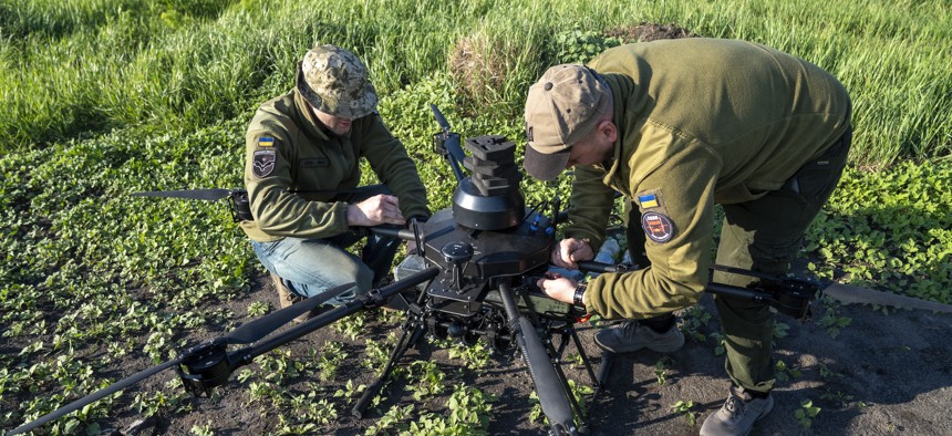 Ukrainian soldiers of the 59th Brigade test a Vampire and Kamikaze BC drone before deployment to the front line in Dnipro, Ukraine, on May 21, 2025.