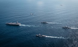 The U.S. Navy's aircraft carrier Gerald R. Ford, left; destroyers Winston S. Churchill, Mahan, Bainbridge; and F/A-18E/F Super Hornets—along with a U.S. Air Force B-52 Stratofortress—operate in U.S. Southern Command's area of operations on Nov. 13, 2025.