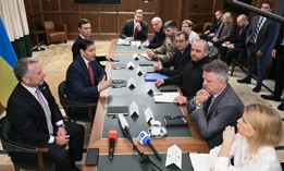 Secretary of State Marco Rubio (center L), flanked by White House Special Envoy Steve Witkoff and Jared Kushner, speaks during a meeting with Ukrainian officials in Hallandale Beach, Florida on November 30, 2025.