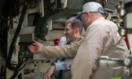 A General Dynamics representative explains the remote weapons system to Argentina's undersecretary of defense for international relations during a Stryker demonstration at Joint Base Lewis-McChord, Wash., Sept. 23, 2025.