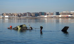 In this U.S. Coast Guard handout, the Coast Guard investigates aircraft wreckage on the Potomac River on January 30, 2025, in Washington, DC.