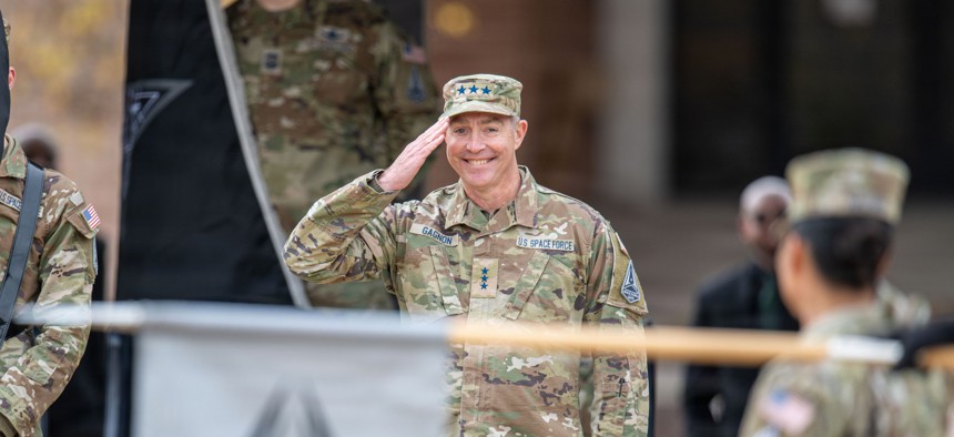 U.S. Space Force Lt. Gen. Gregory Gagnon returns a salute to Guardians and Airmen assigned to United States Space Force Combat Forces Command during a redesignation ceremony at Peterson Space Force Base, Colo., Nov. 3, 2025. 