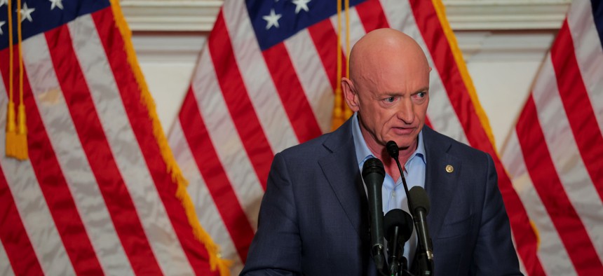 U.S. Sen. Mark Kelly (D-AZ) speaks at a news conference in the U.S. Capitol on December 1, 2025.