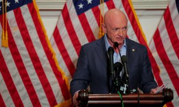 U.S. Sen. Mark Kelly (D-AZ) speaks at a news conference in the U.S. Capitol on December 1, 2025.