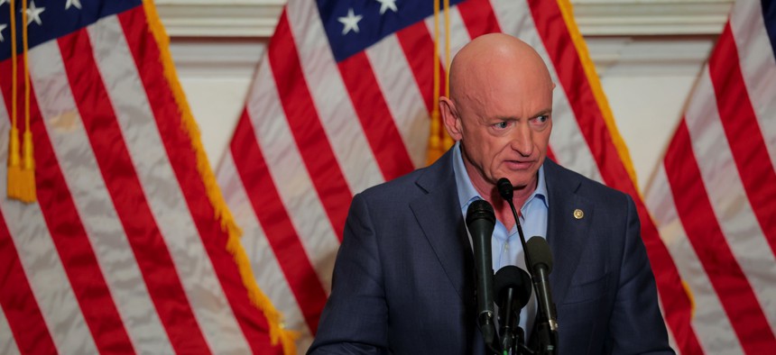 U.S. Sen. Mark Kelly (D-AZ) speaks at a news conference in the U.S. Capitol on December 1, 2025.