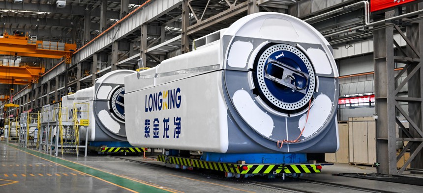 Wind turbine nacelles sit in the Mingyang New Energy Intelligent Manufacturing Industrial Park in the Chinese city of Baotou on July 29, 2025.