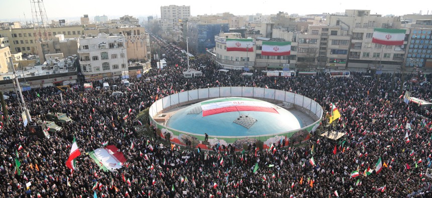 People gathered at Tehran's Enghelab Square on January 12, 2026, after a government call to rally against recent protests across the country.