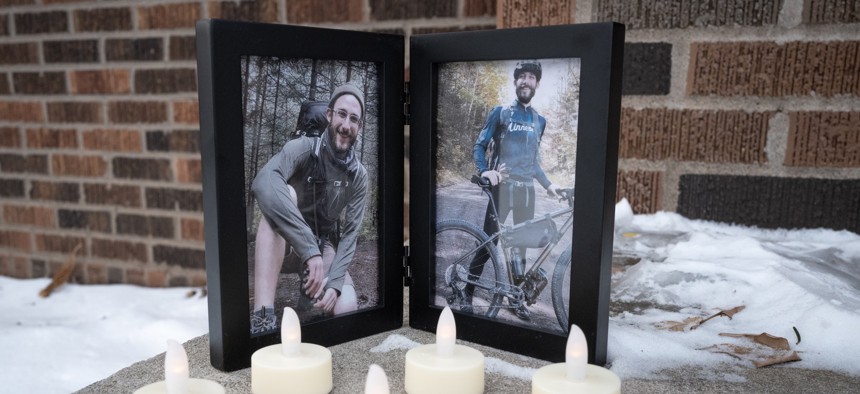 Pictures of Alex Pretti sit in front of his home on Jan. 26, 2026 in Minneapolis, Minnesota. Pretti, an ICU nurse at a VA medical center, died Jan. 25, after being shot multiple times during a brief altercation with Border Patrol agents in Minneapolis. 