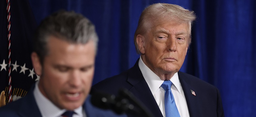 Defense Secretary Pete Hegseth speaks during a press conference with President Donald Trump on January 3, 2026, in Palm Beach, Florida. 