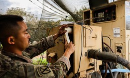 A soldier demonstrates an innovative tool his team manufactured during Joint Pacific Multinational Readiness Center 26-01 Nov. 4, 2025, Schofield Barracks, Hawaii. 