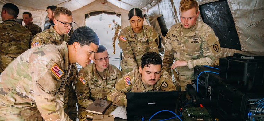 Soldiers with the 25th Infantry Division Artillery receive a fire mission at the brigade tactical operation center as part of their experimentation to integrate next-generation command-and-control systems at Schofield Barracks, Hawaii, Feb. 24, 2026.