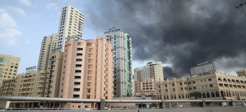 Smoke rises after drone and missile attacks by Iran on the headquarters of the U.S. Navy's Fifth Fleet in Manama, Bahrain, on February 28, 2026.