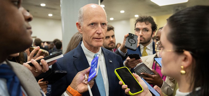 Sen. Rick Scott, R-Fla., seen here speaking to reporters on March 3, 2026, placed a hold on Sean Plankey’s nomination to lead CISA last year.