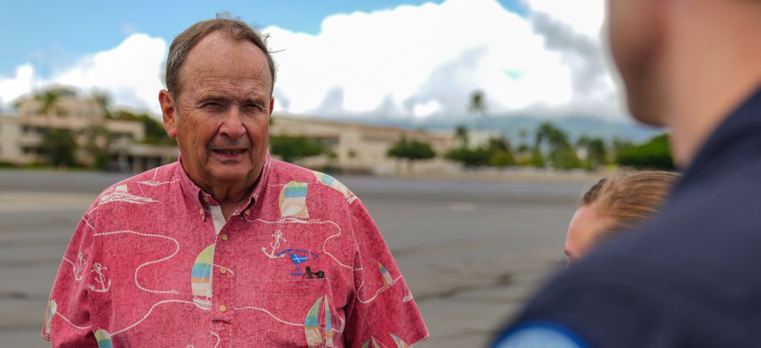 Bob Stephenson, U.S. Indo-Pacific Command's director of requirements and resources, gets briefed about a semi-autonomous aircraft at Joint Base Pearl Harbor-Hickam, Hawaii, on July 28, 2025. 