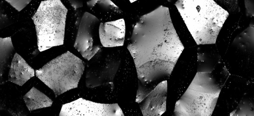 Tungsten fragments under 1000x magnification /