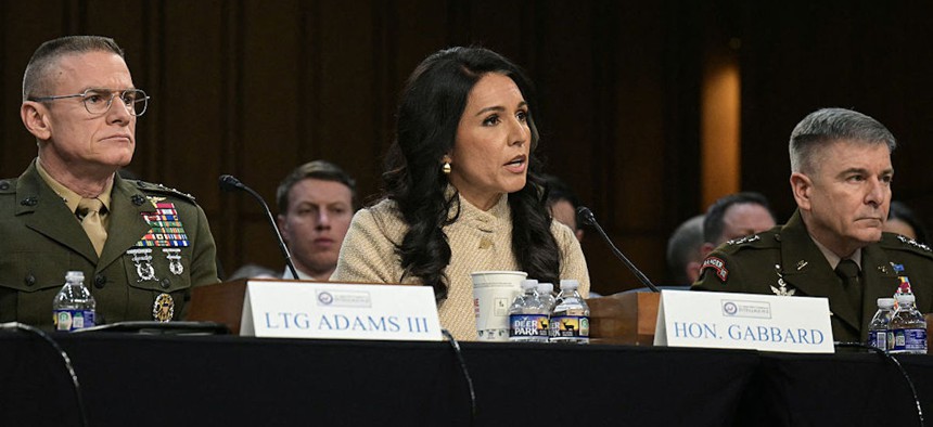 Director of Defense Intelligence Agency James Adams III, Director of National Intelligence Tulsi Gabbard, and Acting Commander of US Cyber Command William Hartman testify during a Senate Committee on Intelligence hearing to examine worldwide threats, on Capitol Hill in Washington, DC, on March 18, 2026.