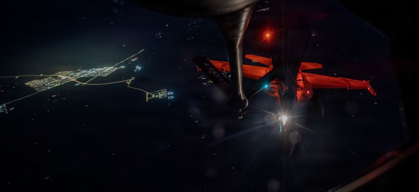 A U.S. Navy F/A-18F Super Hornet aircraft refuels from a U.S. Air Force KC-135 Stratotanker aircraft during a mission in support of Operation Epic Fury, March 8, 2026..