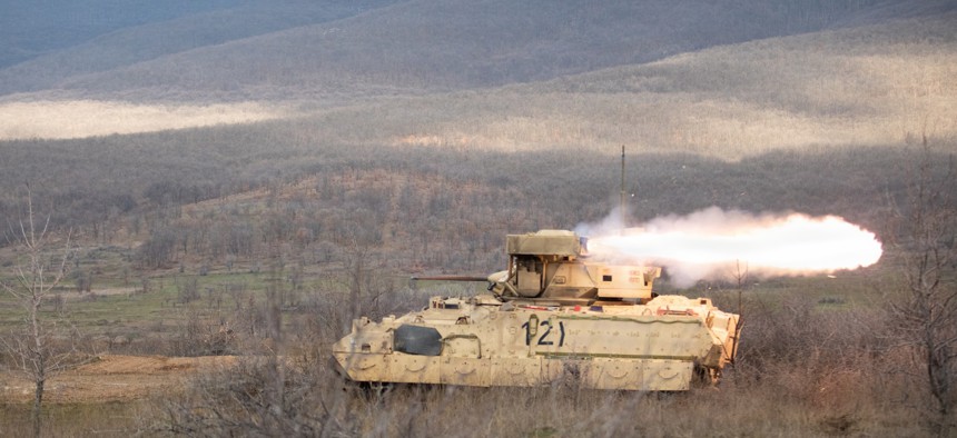 An M2A3 Bradley Infantry Fighting Vehicle uses a twin-tube, turret-mounted launcher to fire an anti-tank missile, Feb. 25, 2026, on Novo Selo Training Area, Bulgaria. 