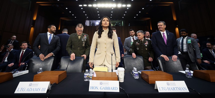 Top Trump administration intelligence officials arrive to testify at a Senate Intelligence Committee hearing on worldwide threats in the Hart Senate Office Building on March 18, 2026.