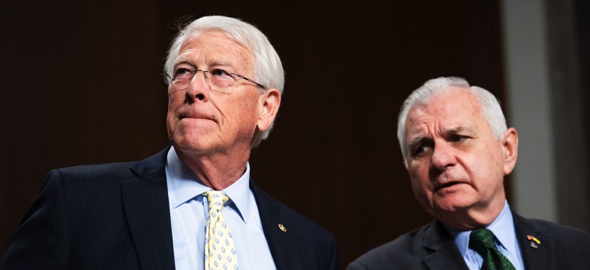 Chairman Roger Wicker, R-Miss., left, and ranking member Sen. Jack Reed, D-R.I., arrive for the Senate Armed Services Committee hearing on "Low-Cost Munitions," in Dirksen building on Tuesday, March 24, 2026.