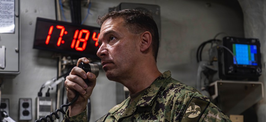 U.S. Navy Adm. Brad Cooper, commander of U.S. Central Command, makes an announcement aboard Nimitz-class aircraft carrier USS Abraham Lincoln (CVN 72) in the Arabian Sea, Feb. 7, 2026.