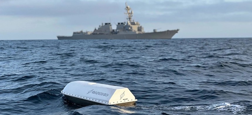An unmanned surface vehicle made by Saronic Technologies conducts testing during a Navy exercise off the coast of California in 2023.