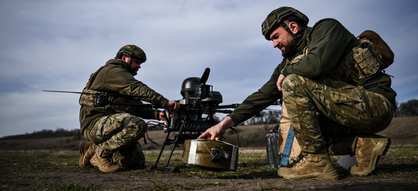 Soldiers from a drone unit of a battalion of Ukraine's 422nd Separate Unmanned Systems Regiment ''Luftwaffe'' prepare a Baba Yaga heavy bomber drone before a daytime training flight in the Zaporizhzhia direction, Ukraine, on March 23, 2026. 