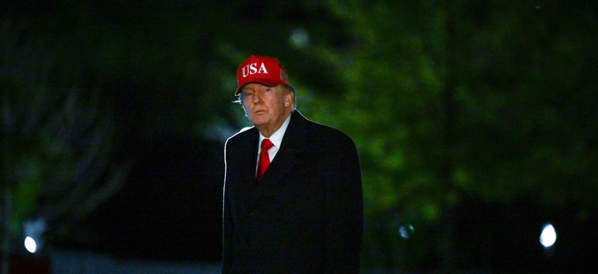 President Trump makes his way across the South Lawn of the White House upon returning to Washington, D.C., on April 12, 2026, after attending a UFC event and spending the weekend at his Trump National Doral Miami resort.