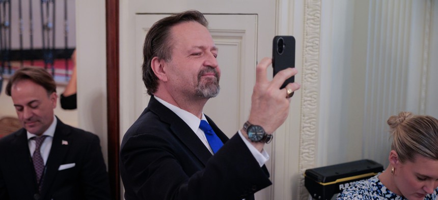Sebastian Gorka, White House Senior Director for Counterterrorism, records President Trump during a White House event held to urge passage of legislation on June 26, 2025.