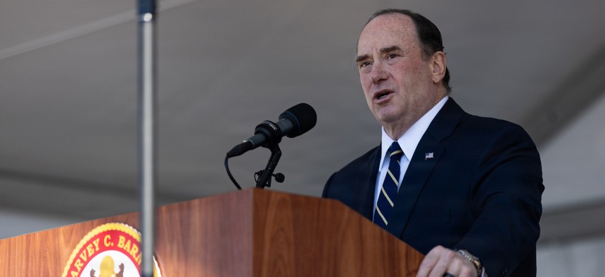 John Phelan delivers a speech during the USS Harvey C. Barnum Jr. ship commissioning at Naval Station Norfolk, Virginia, April 11, 2026. 