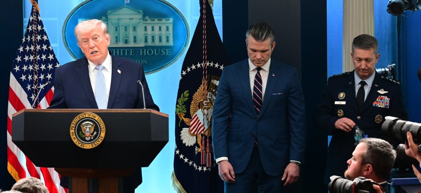 U.S. President Donald Trump and Defense Secretary Pete Hegseth speak to reporters at the White House on April 6, 2026.
