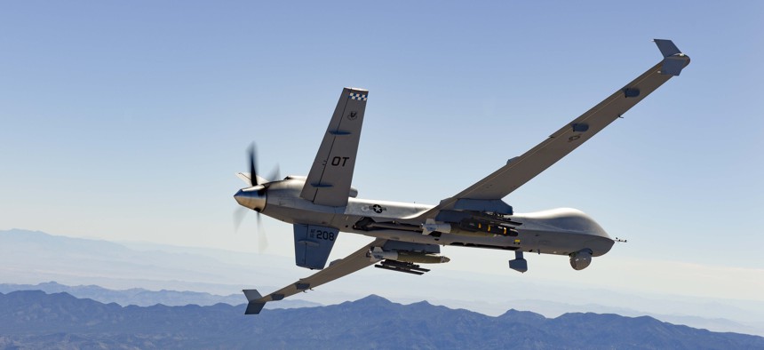 A 2023 photo of an MQ-9 Reaper during live-fire exercises over the Nevada Test and Training Range.