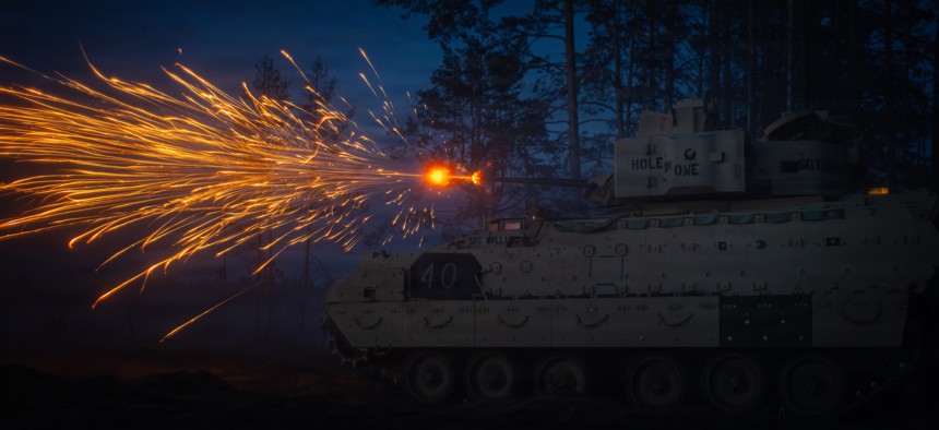 An M2A3 Bradley Infantry Fighting Vehicle of 1st Cavalry Regiment fires at a drone with its M242 25mm Bushmaster chain gun during Project Flytrap at Pabradė Training Area, Lithuania, May 10, 2026.