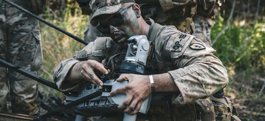 A 25th Infantry Division soldier prepares a U.S. Army C-100 drone for flight during a joint jungle patrol demonstration with the Philippine Army as part of Exercise Balikatan 2026 at Fort Magsaysay, Philippines on April 30, 2026. 