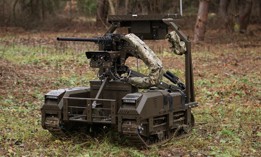 The Droid TW 12.7 armed ground robot from DevDroid. 