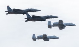 Two F-15E Strike Eagle aircraft, both assigned to the 366th Fighter Wing, fly alongside two A-10 Thunderbolt II aircraft assigned to the 124th Fighter Wing, Idaho Air National Guard at the Gunfighter Skies Air Show at Mountain Home Air Force Base, Idaho, May 16, 2026.