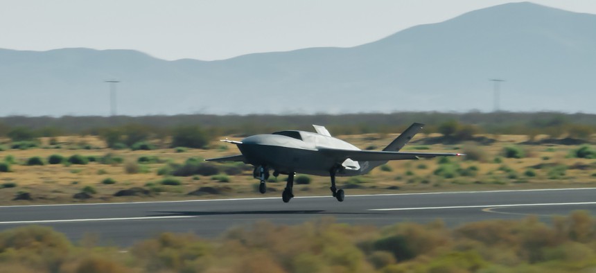 A YFQ-42A Collaborative Combat Aircraft takes off during flight testing at a California test location in 2025.
