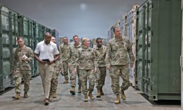 Maj. Gen. Gavin Gardner, commander of the 8th Theater Sustainment Command, hosts Lt. Gen. Michelle Donahue, the deputy chief of staff for Army logistics, during a tour the Joint Theater Distribution Center, April 12, 2026, in Agila, Philippines. 