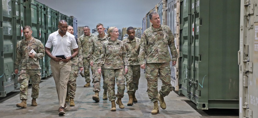 Maj. Gen. Gavin Gardner, commander of the 8th Theater Sustainment Command, hosts Lt. Gen. Michelle Donahue, the deputy chief of staff for Army logistics, during a tour the Joint Theater Distribution Center, April 12, 2026, in Agila, Philippines.