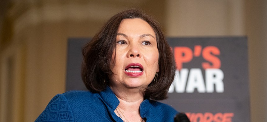 Sen. Tammy Duckworth, D-Ill., speaks during a news conference in the U.S. Capitol on April 14.
