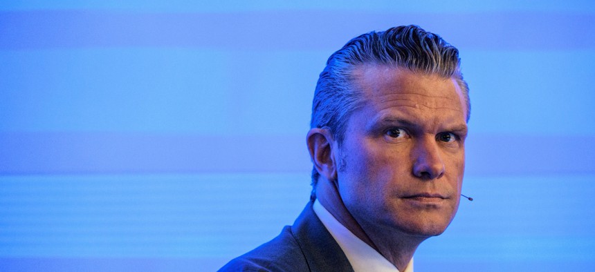 Defense Secretary Pete Hegseth looks on during the 23rd IISS Shangri-La Dialogue at the Shangri-La Hotel on May 30, 2026, in Singapore.
