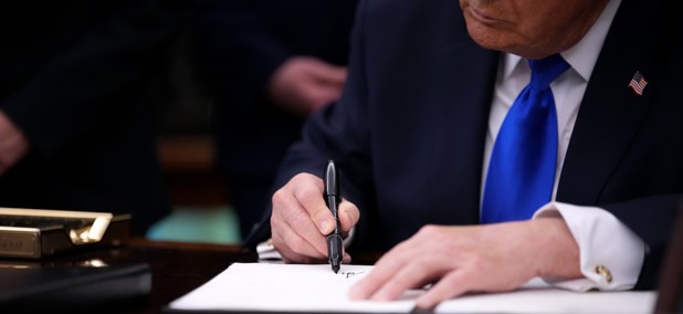 Trump strips civil-service protections from thousands of feds