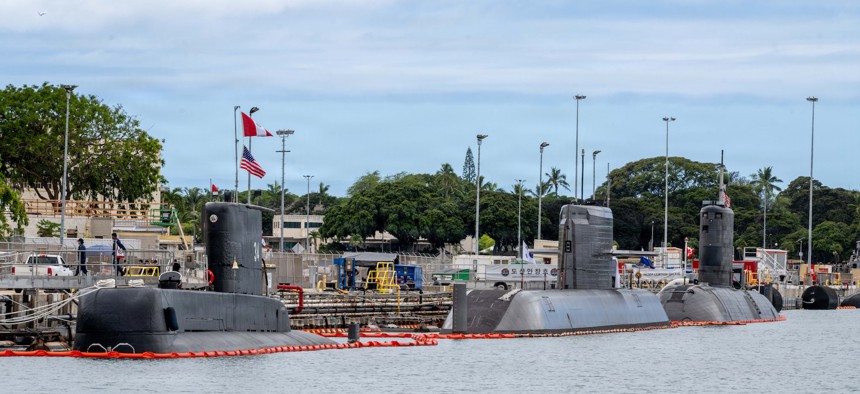 Peruvian Navy submarine BAP Chipana (left), Republic of Korea submarine Dosan Ahn Chang-ho, and Royal Canadian Navy submarine HMCS Corner Brook moored pierside at Joint Base Pearl Harbor-Hickam, Hawaii, in preparation for Exercise Rim of the Pacific 2026, June 23, 2026. 