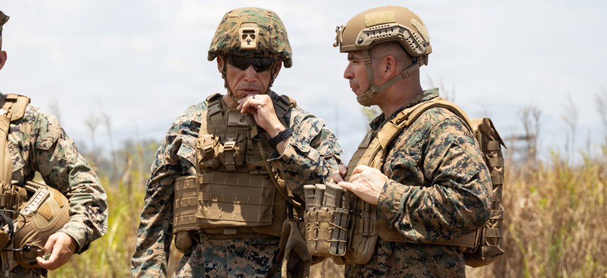 U.S. Marine Corps Brig. Gen. Omar Randall, left, commanding general of the Marine Air-Ground Task Force for Exercise Balikatan 2026 speaks with Col. Gabriel Diana, commanding officer of 3rd Marine Littoral Regiment, 3rd Marine Division, during the integrated air and missile defense event as part of Balikatan 2026 at Naval Station Leovigildo Gantioqu, Philippines, April 28, 2026.